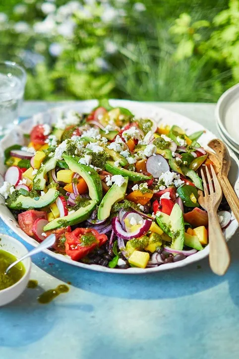 healthy summer salad with avocado tomato feeta