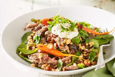 Warm slow-roasted lamb, barley and carrot salad with yogurt