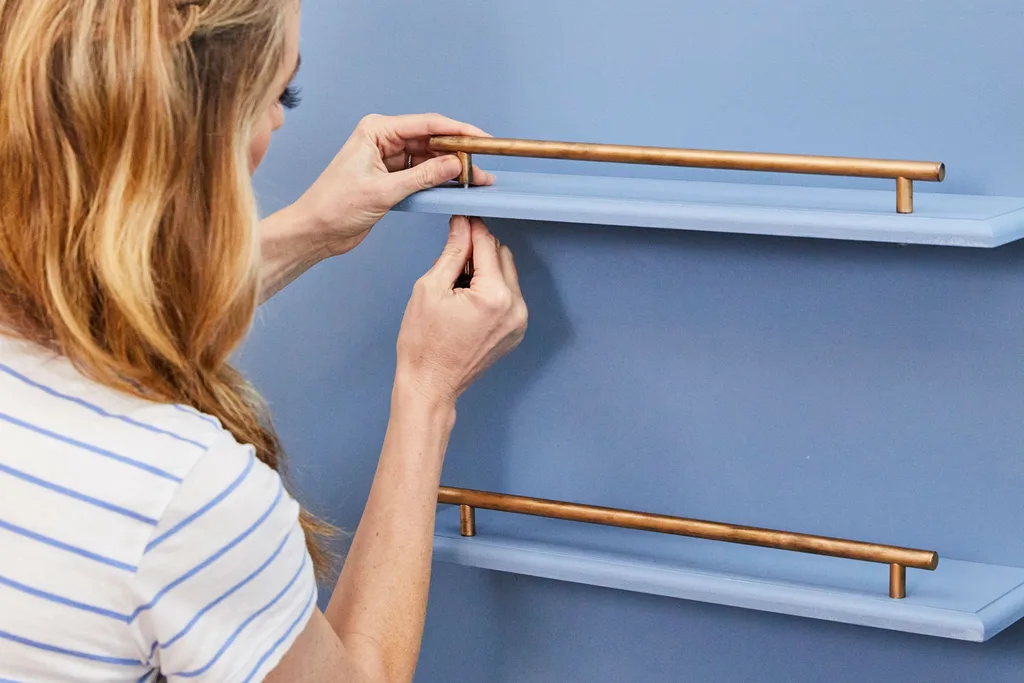 juliet attaching bar handles to shelf upcycled chest of drawers