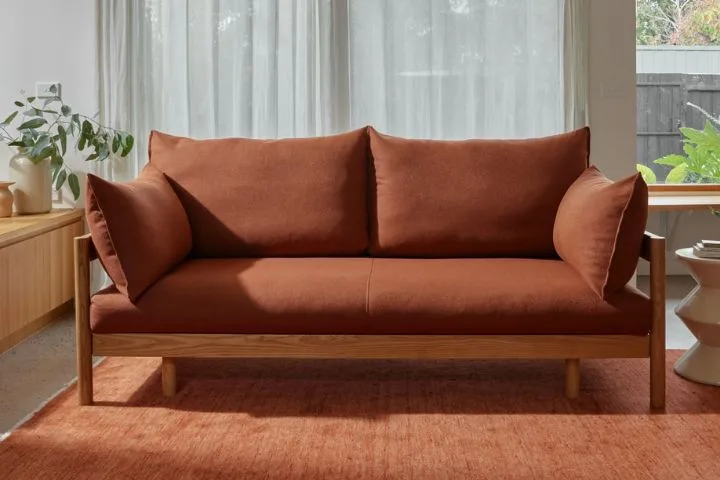 Eva slideaway sofa bed in terracotta.