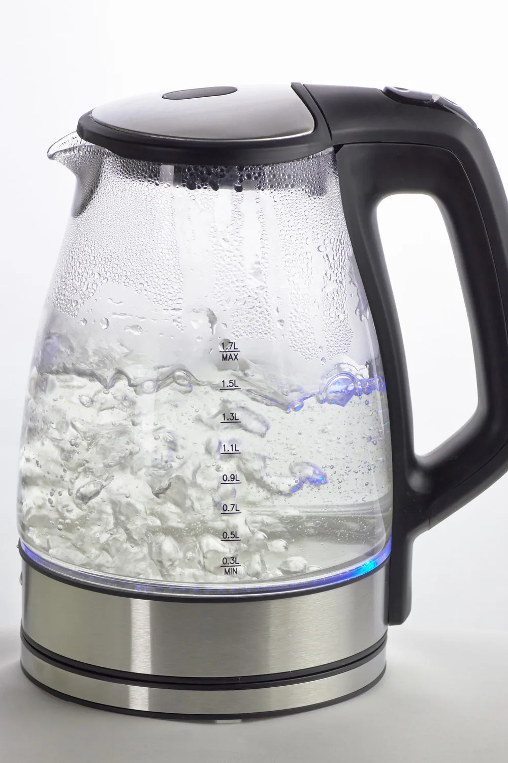 Cleaning a glass kettle with a vinegar and water solution is a gentle and effective option.