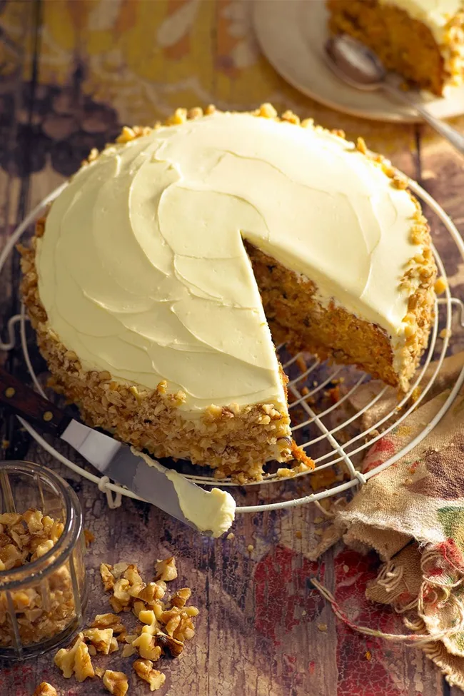 carrot cake with walnut crust on the outside