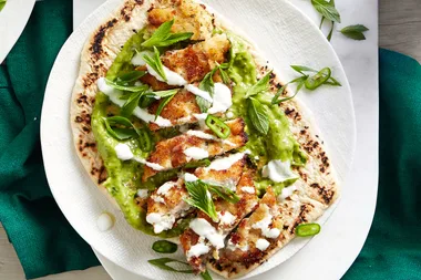 Chicken schnitzel wraps with garlic avocado dip