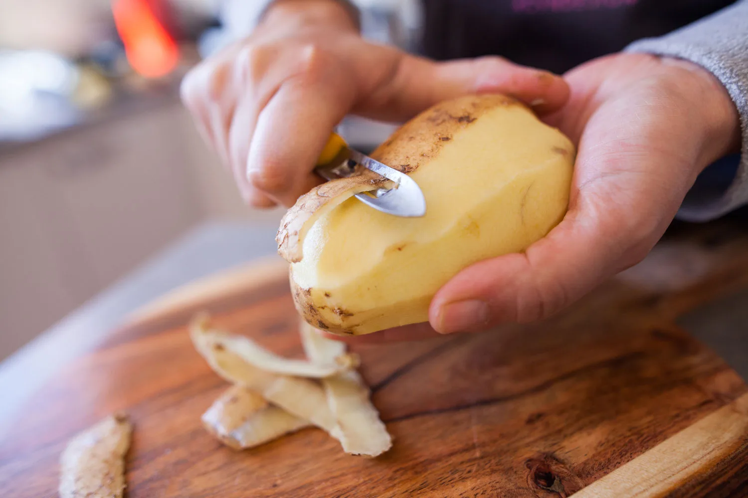 peeling potatoes