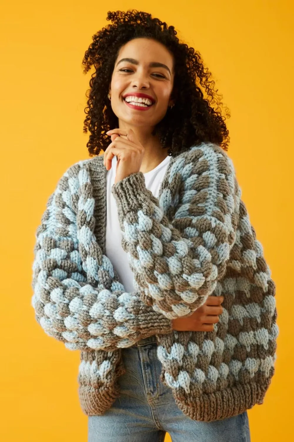 Bubble stitch cardigan knitting pattern from Love Crafts.