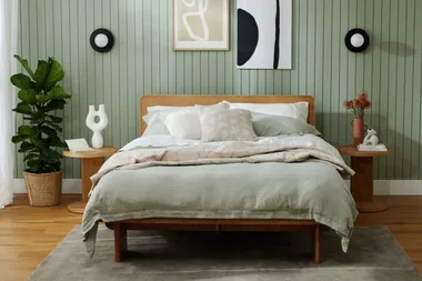 Koala mattress bed set in a sage green room, available with a Koala discount code