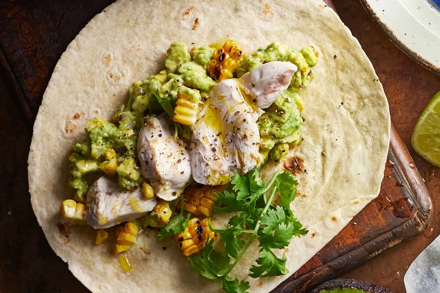Colin’s goddess guacamole wrap with charred corn and chicken