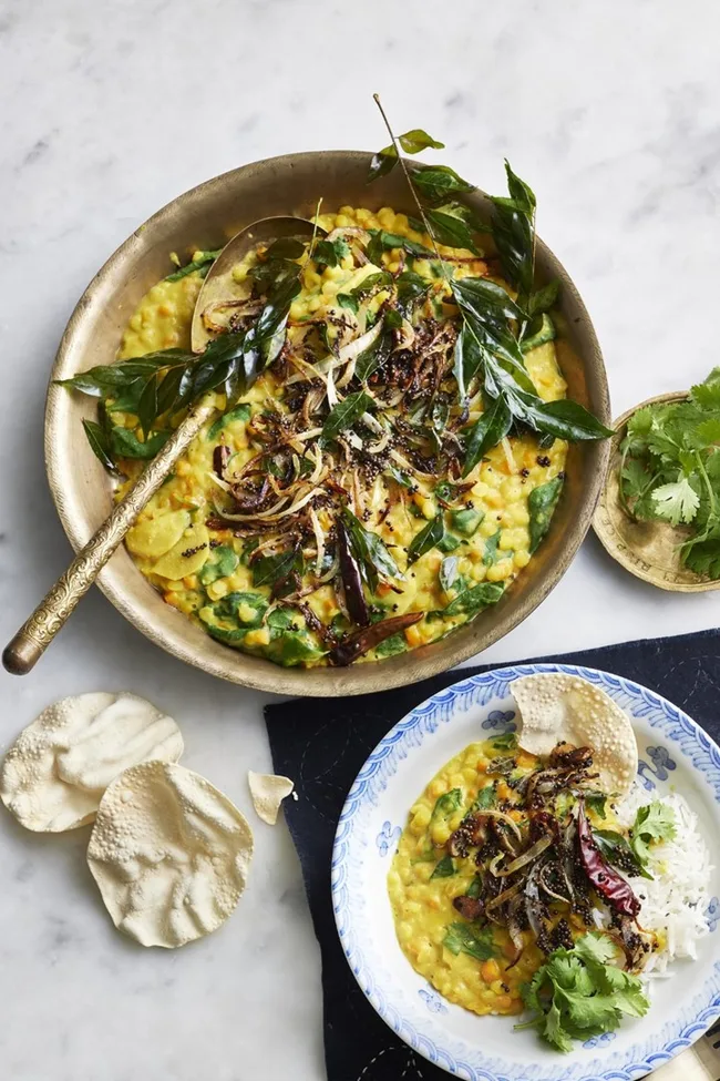 clarissa's indian curry in large bowl with spoon sticking out