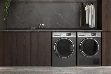 Dark-grey washer and dryer from The Good Guys in a laundry room, available with Good Guys promo codes