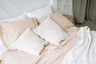 Should you wash new bedsheets before using them?