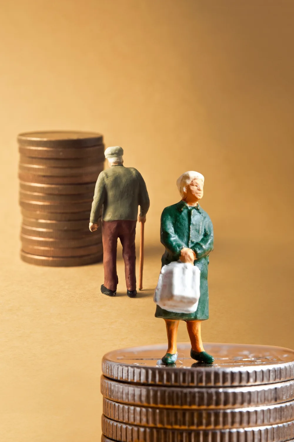 cost-of-caring-small-figurines-with-coins