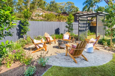 build your own outdoor retreat deck chairs in a circle of gravel with outdoor firepit