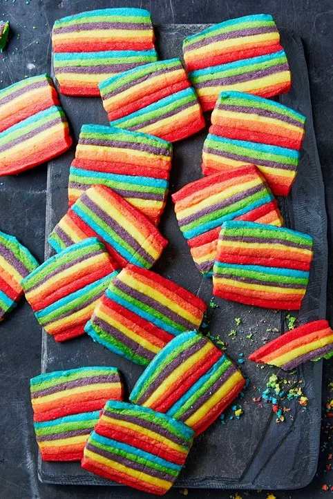 rainbow stripe biscuits spread out over tray