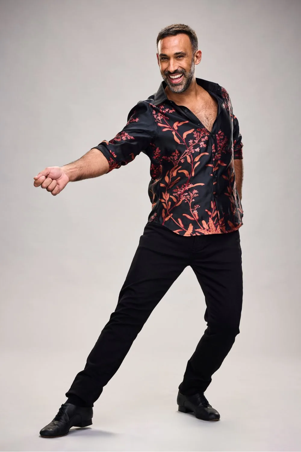 adam dovile in red and black top for dancing with the stars