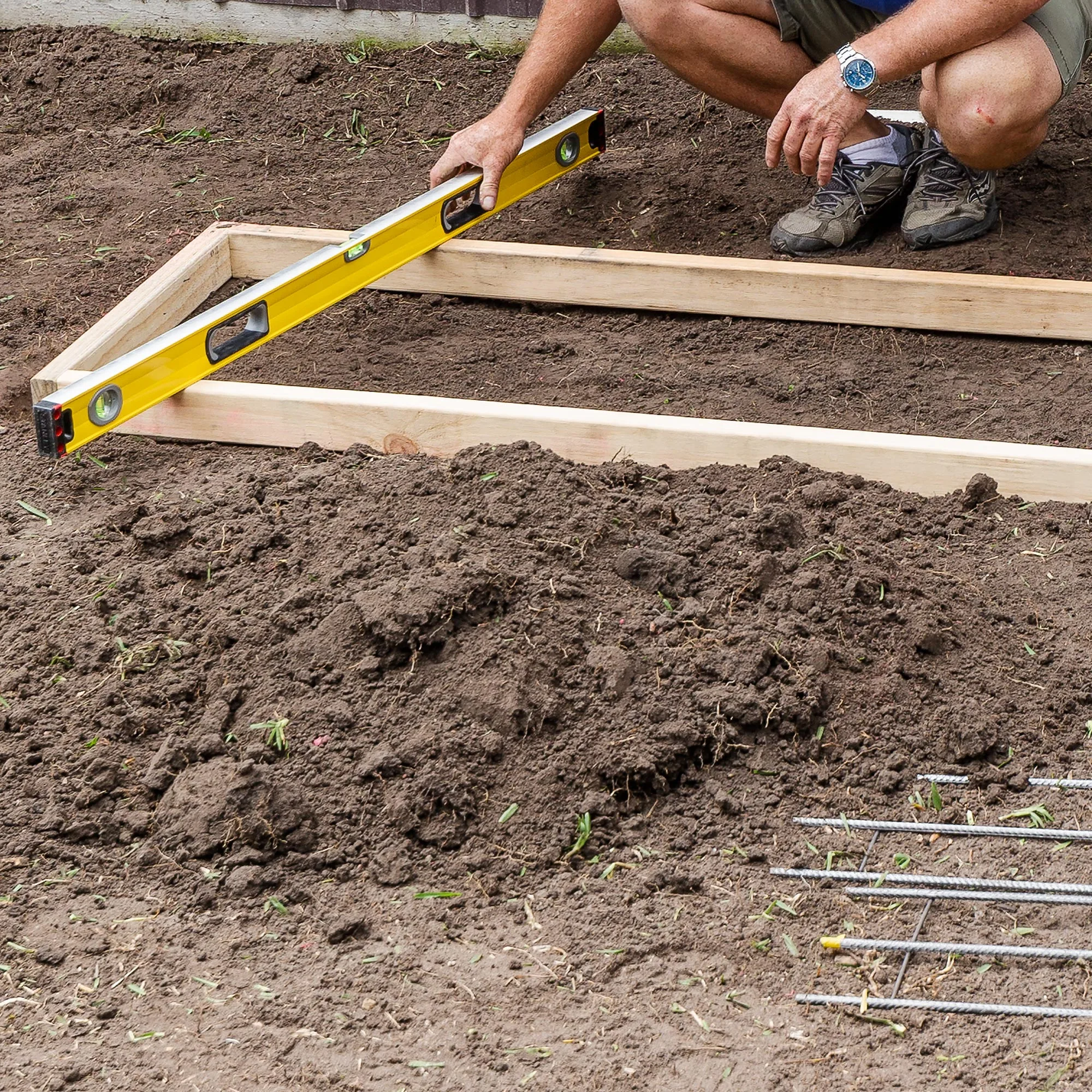 Step 1 involves marking the section for your bench and laying formwork.