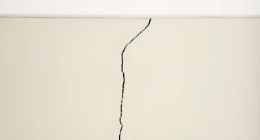 How to smooth cracks and holes in brick walls