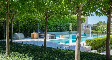Install a pool fence that doesn’t compromise the look of your backyard