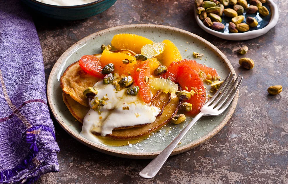 Ricotta hotcakes with citrus, pistachio and honey - Better Homes & Gardens Australia