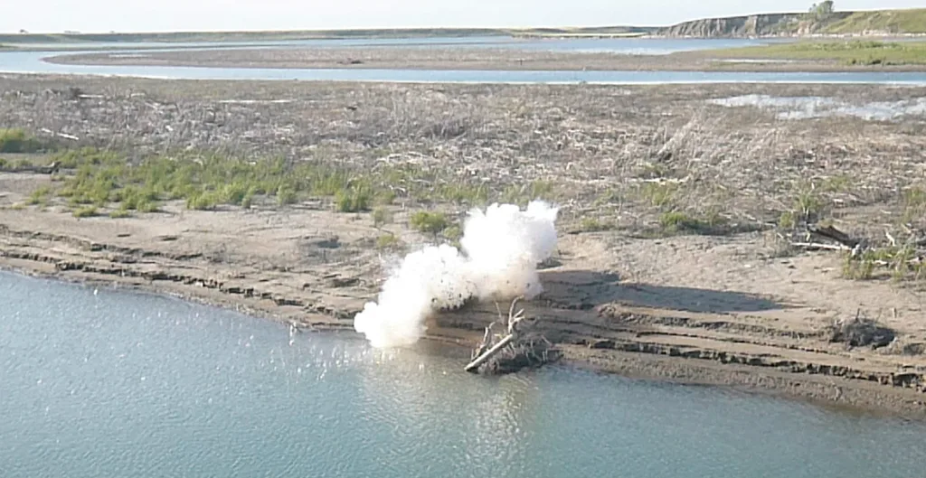 Photo of man blowing himself up at the abandoned train track reservoir