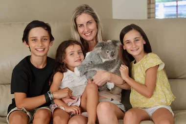 Hayley Shute (centre) cares for injured wildlife including koalas at home