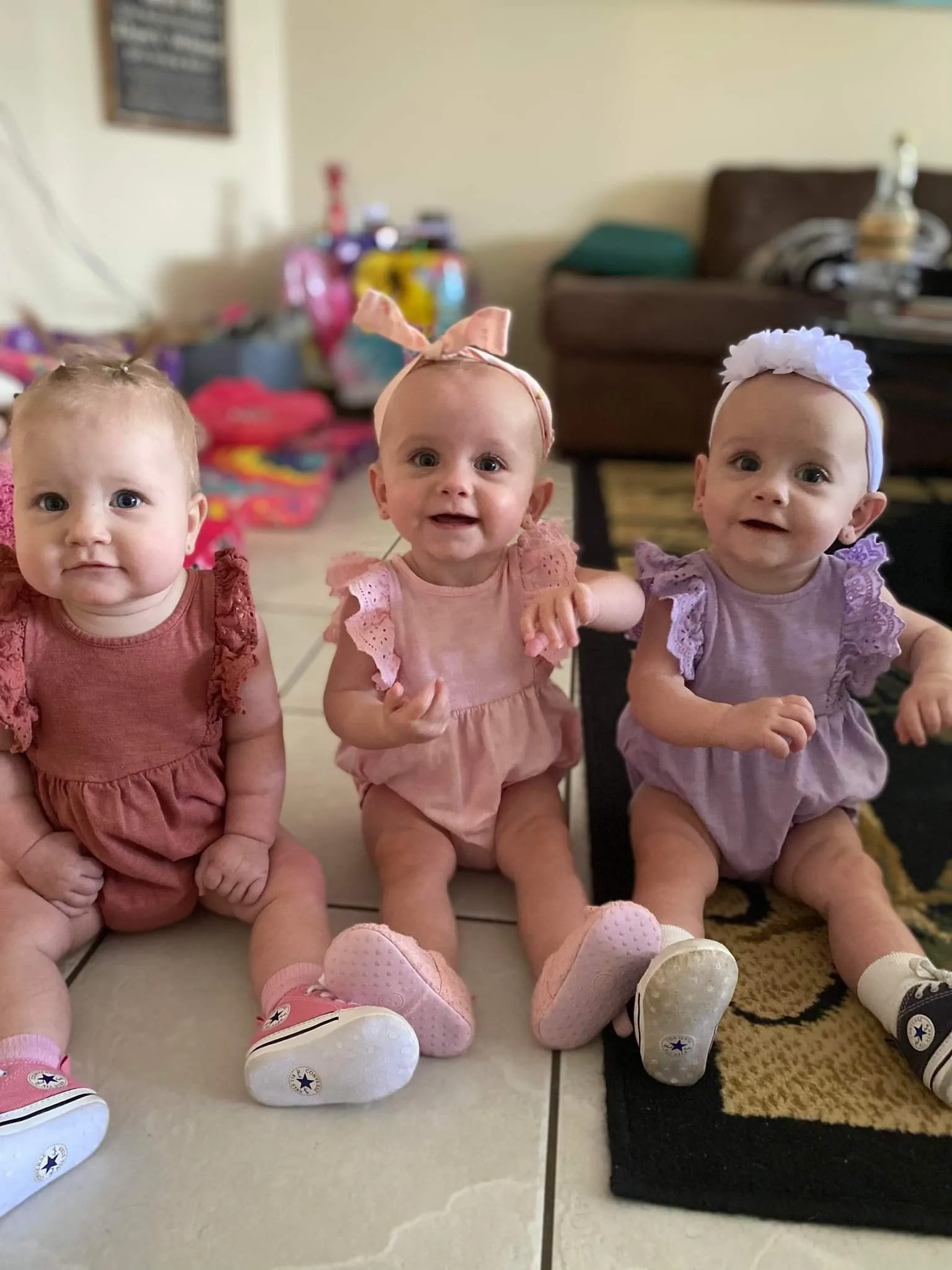Image of triplet girls wearing matching outfits