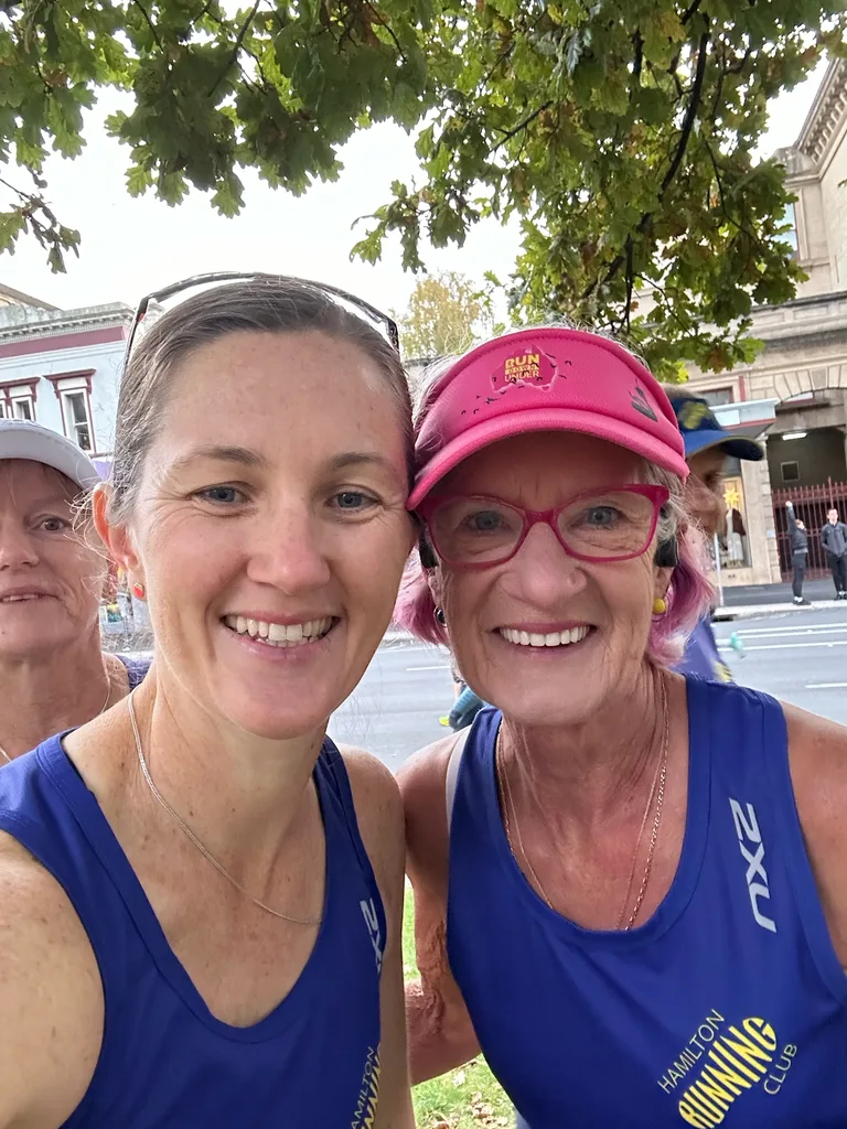 Image of two women running a marathon