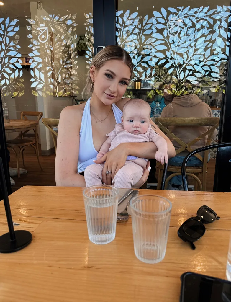 Maddy holding her daughter London