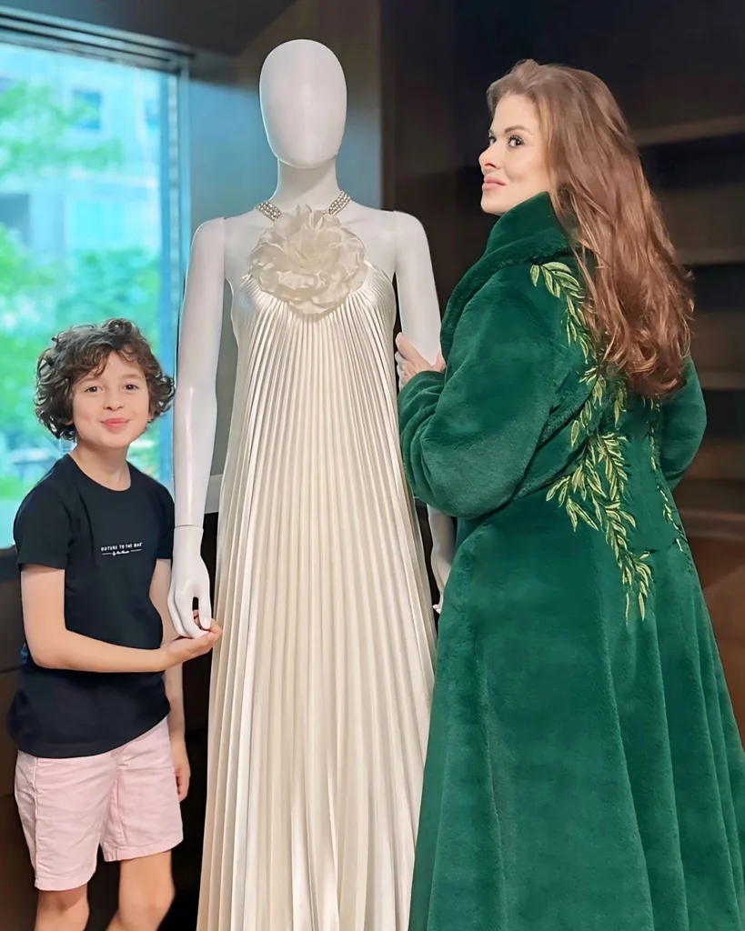 Max Alexander with Debra Messing