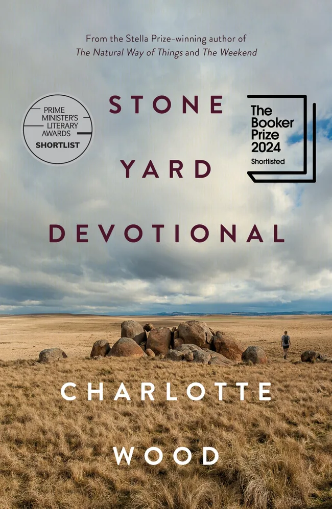Book cover art of Stone Yard Devotional by Charlotte Wood - shows a pile of rocks in desolate land