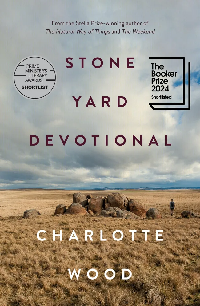 Book cover art of Stone Yard Devotional by Charlotte Wood - shows a pile of rocks in desolate land