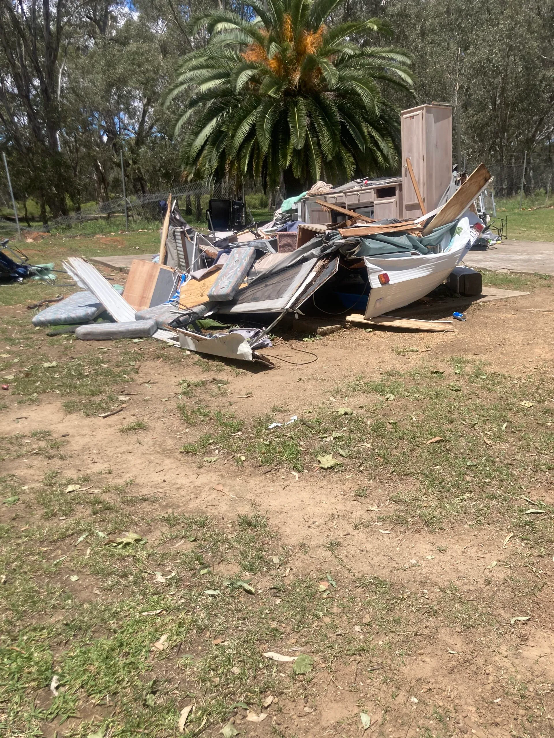 The caravan was smashed to pieces after being crushed by a 40-metre tree