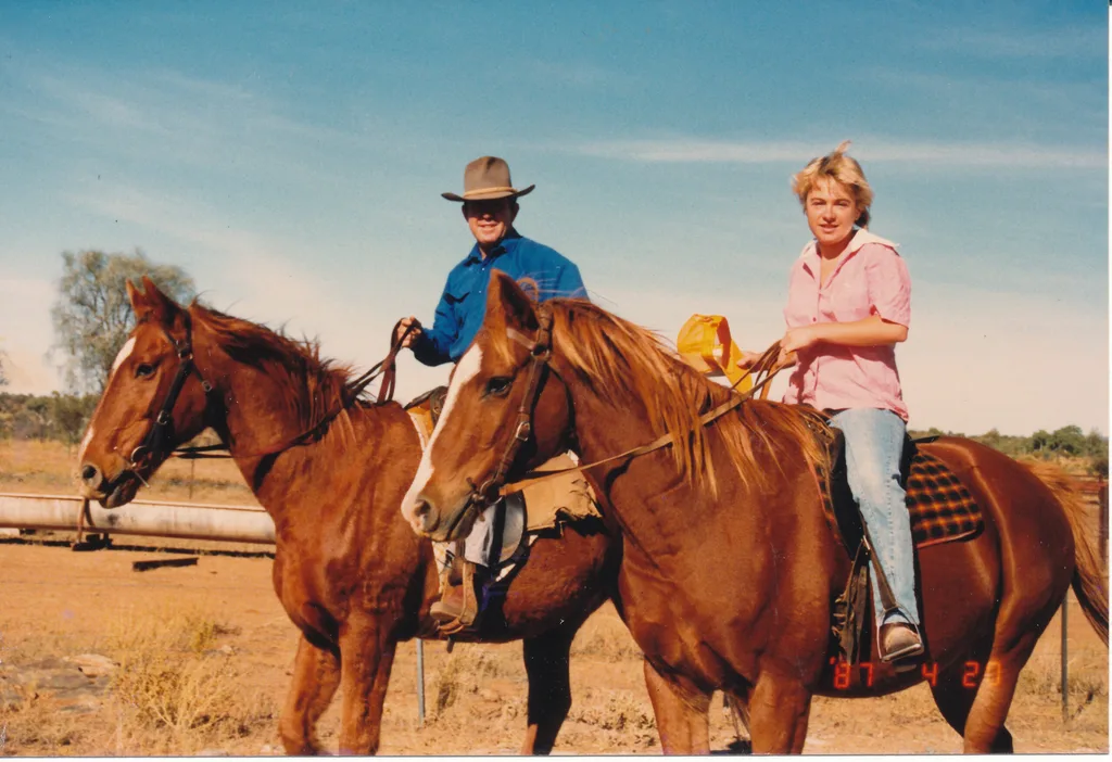 Tanya and her dad going mustering on their horses.