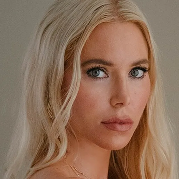 A picture of former Swedish escort Isabel Erikkson who was kidnapped by doctor Martin Trenneborg. She is blonde and looking side on at the camera.