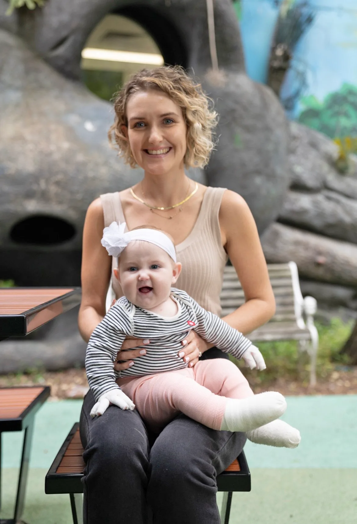 Image of mum and daughter wrapped in bandages