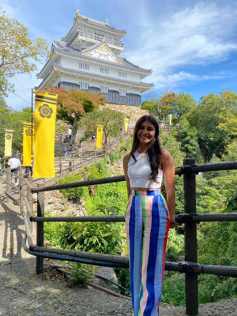 Image of woman standing in front of Gifu Castle