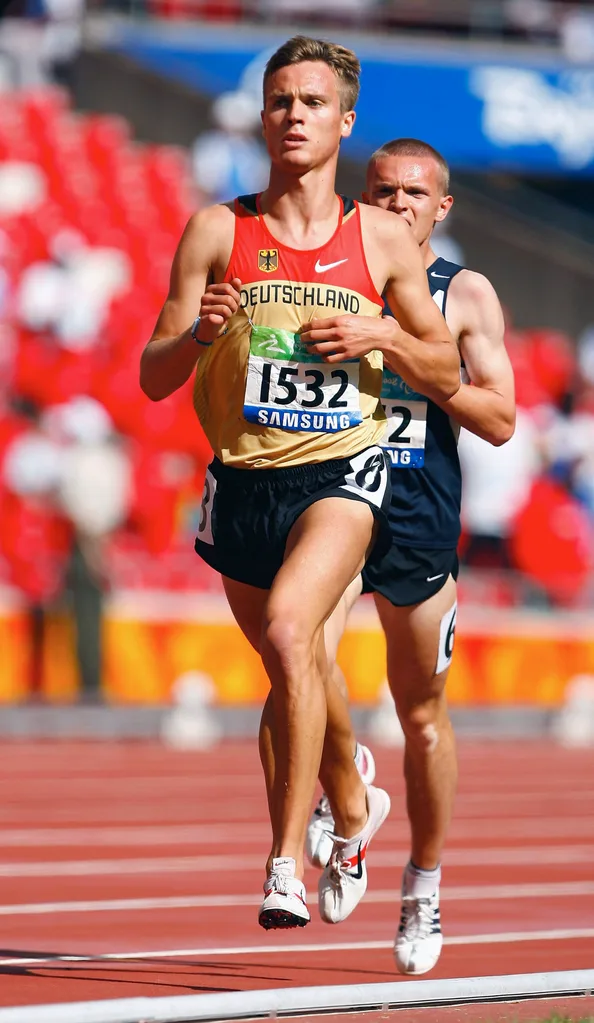 Image of blind man running in the Paralympics