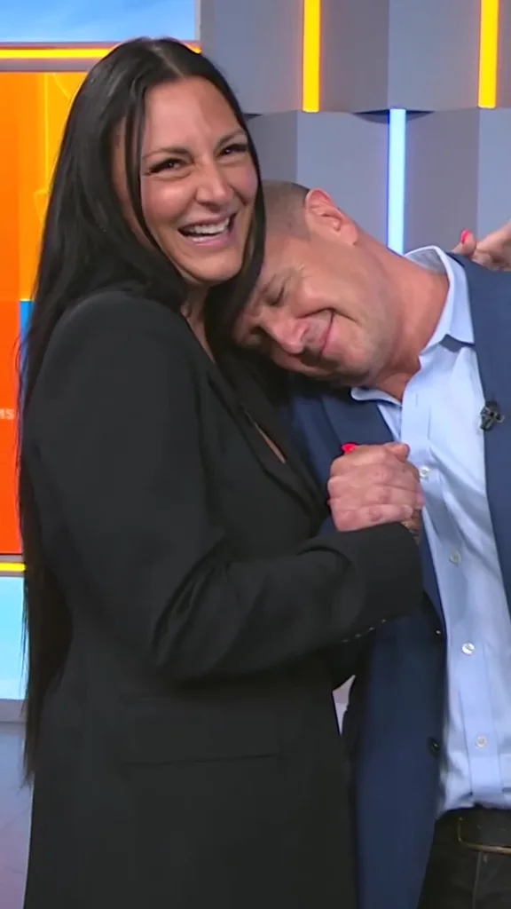 Missy on The Morning Show with Kylie and Larry, talking about cuddling. She is cuddling with Larry.