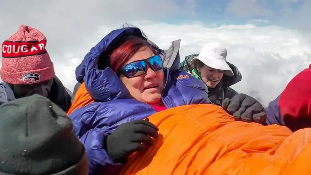 Image of woman sitting in wheelchair on Kilimanjaro