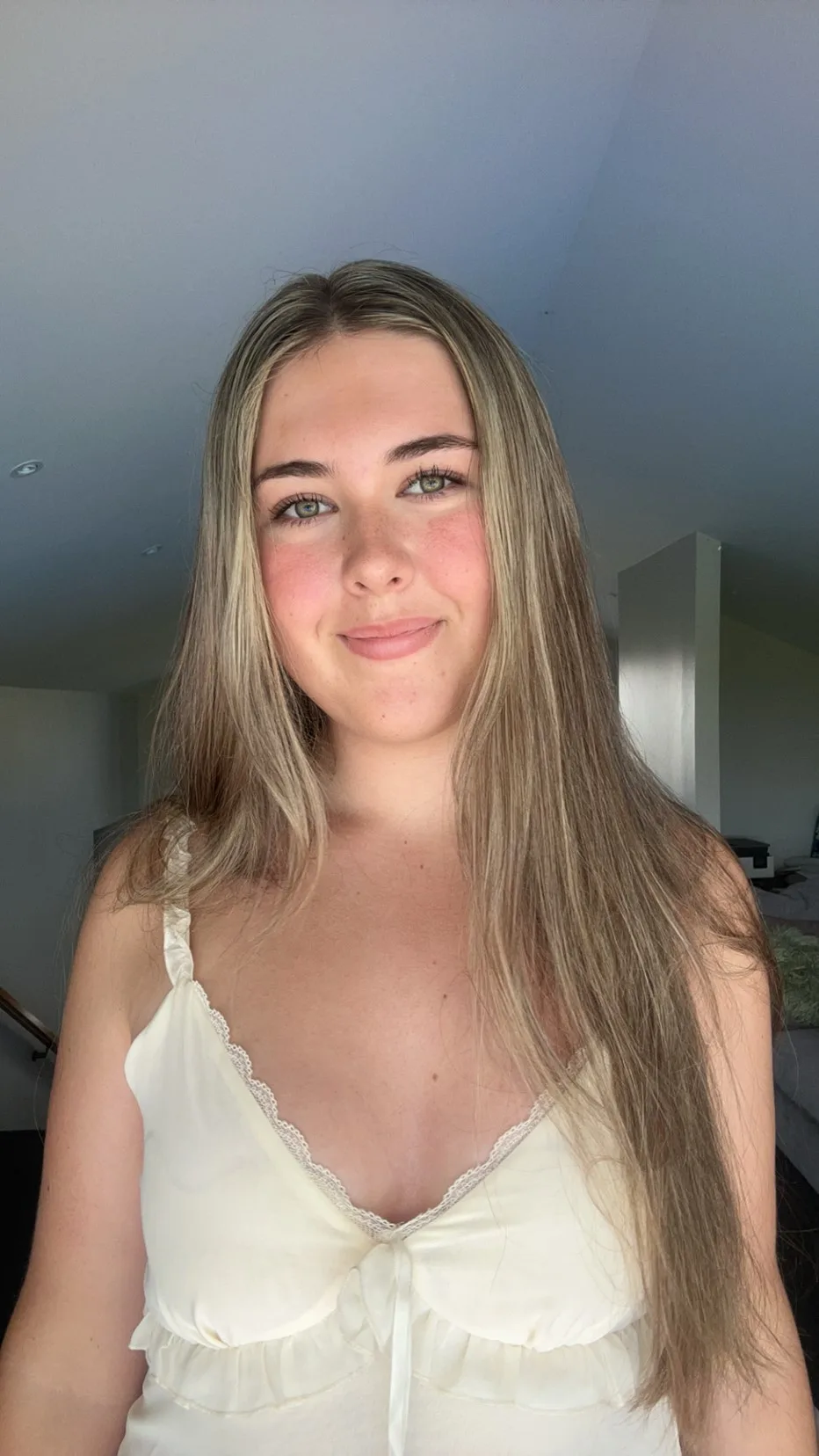 young teenager in white top