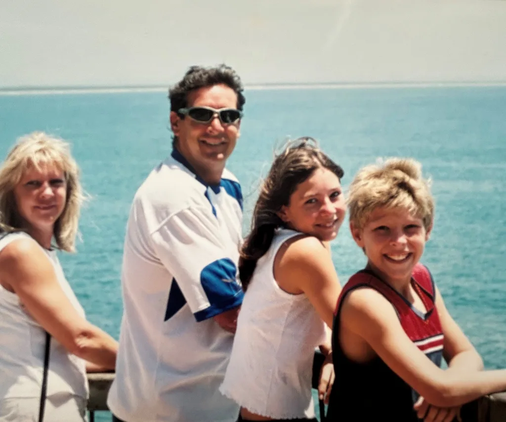 Image of family on holiday by the sea
