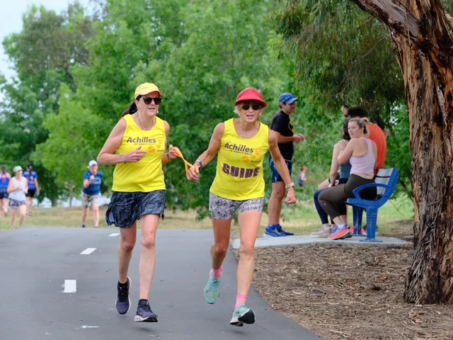women in yellow running