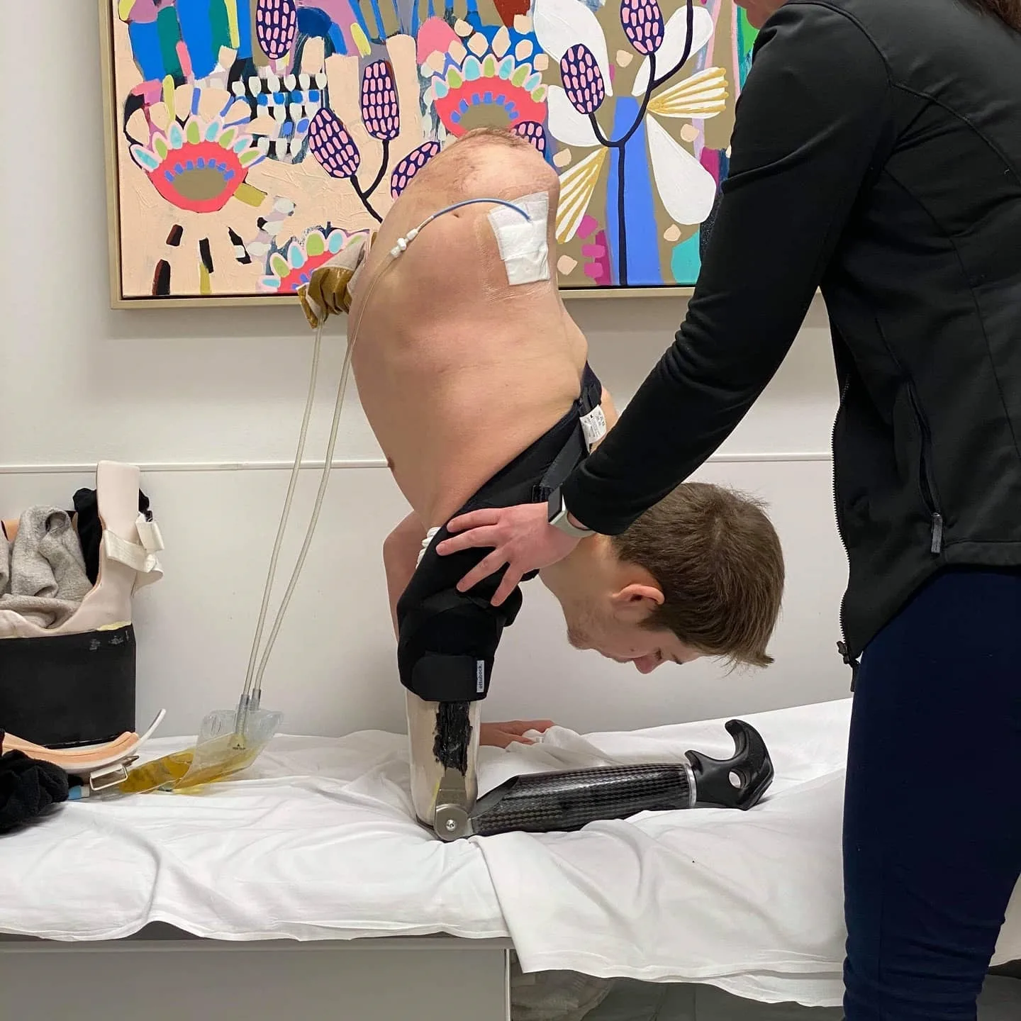 Man balancing on prosthetic arm