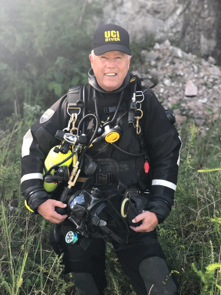 Image of underwater detective in wetsuit