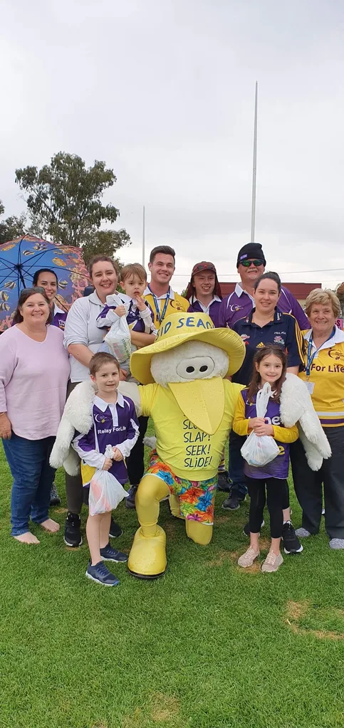 Image of cancer survivor and her family