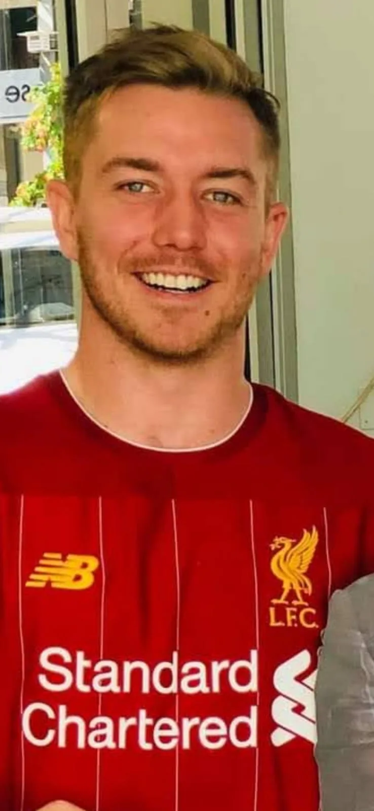 Image of man wearing red top before being stranded in Aussie bush