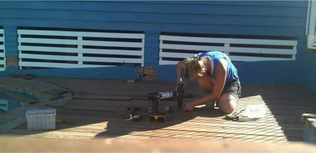 woman building deck