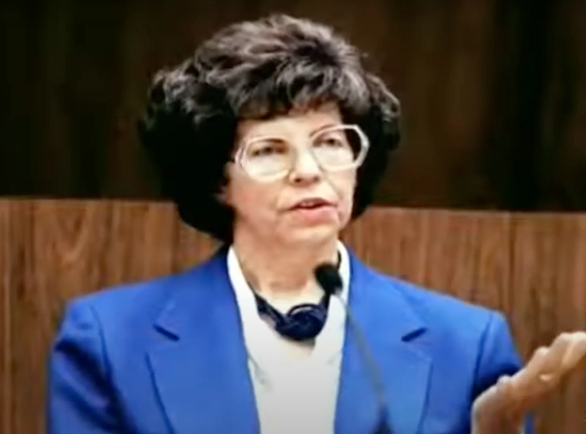 Dorothy Boyer in blue blazer and white blouse in court