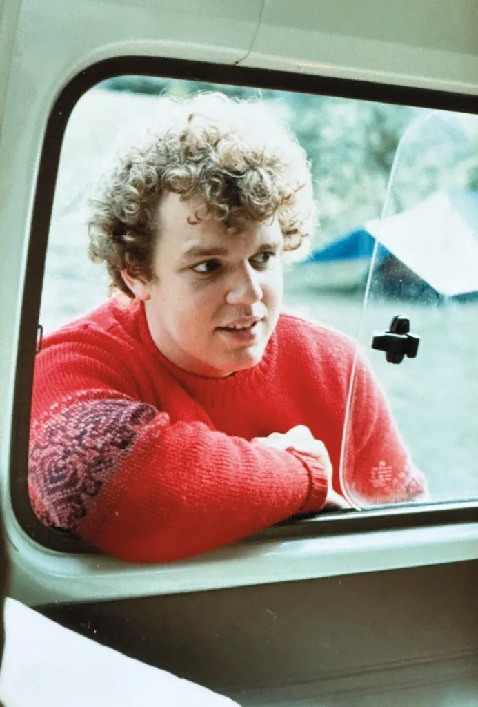 Image of man wearing red shirt