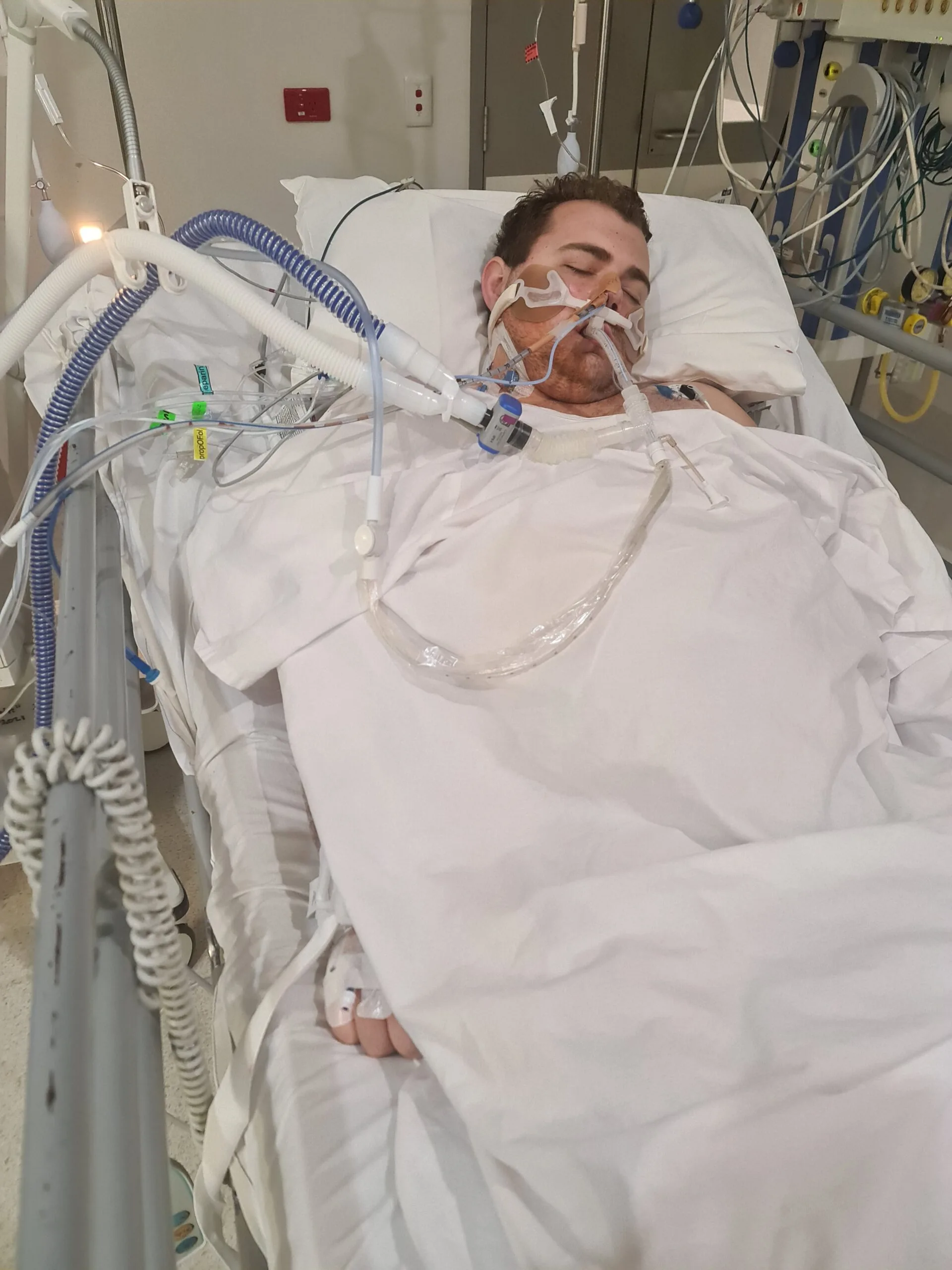 Jake in hospital bed