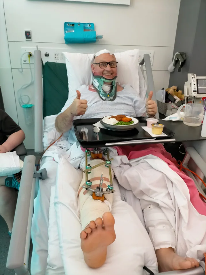 man in hospital bed